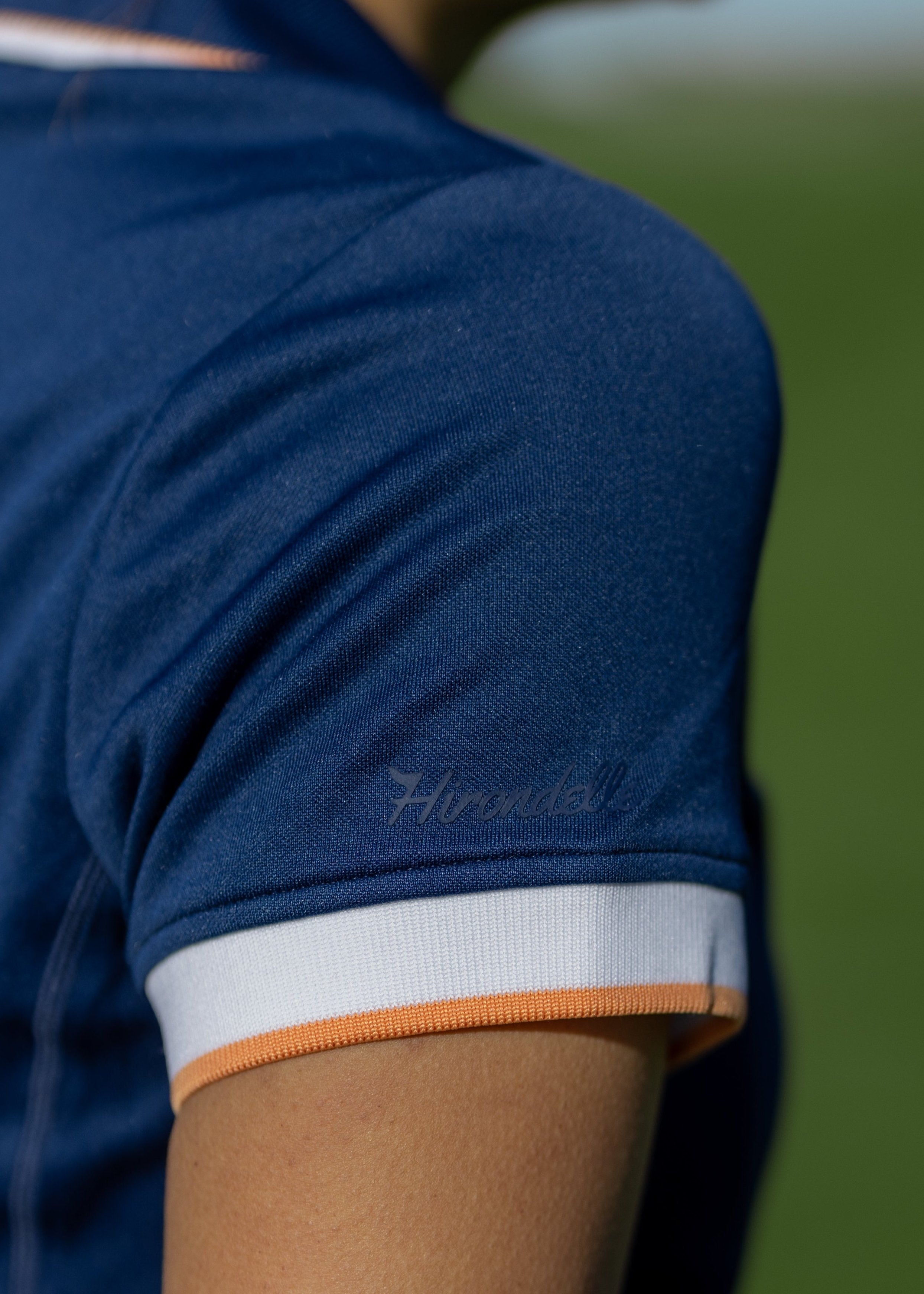 Hirondelle Koko Polo in Navy logo