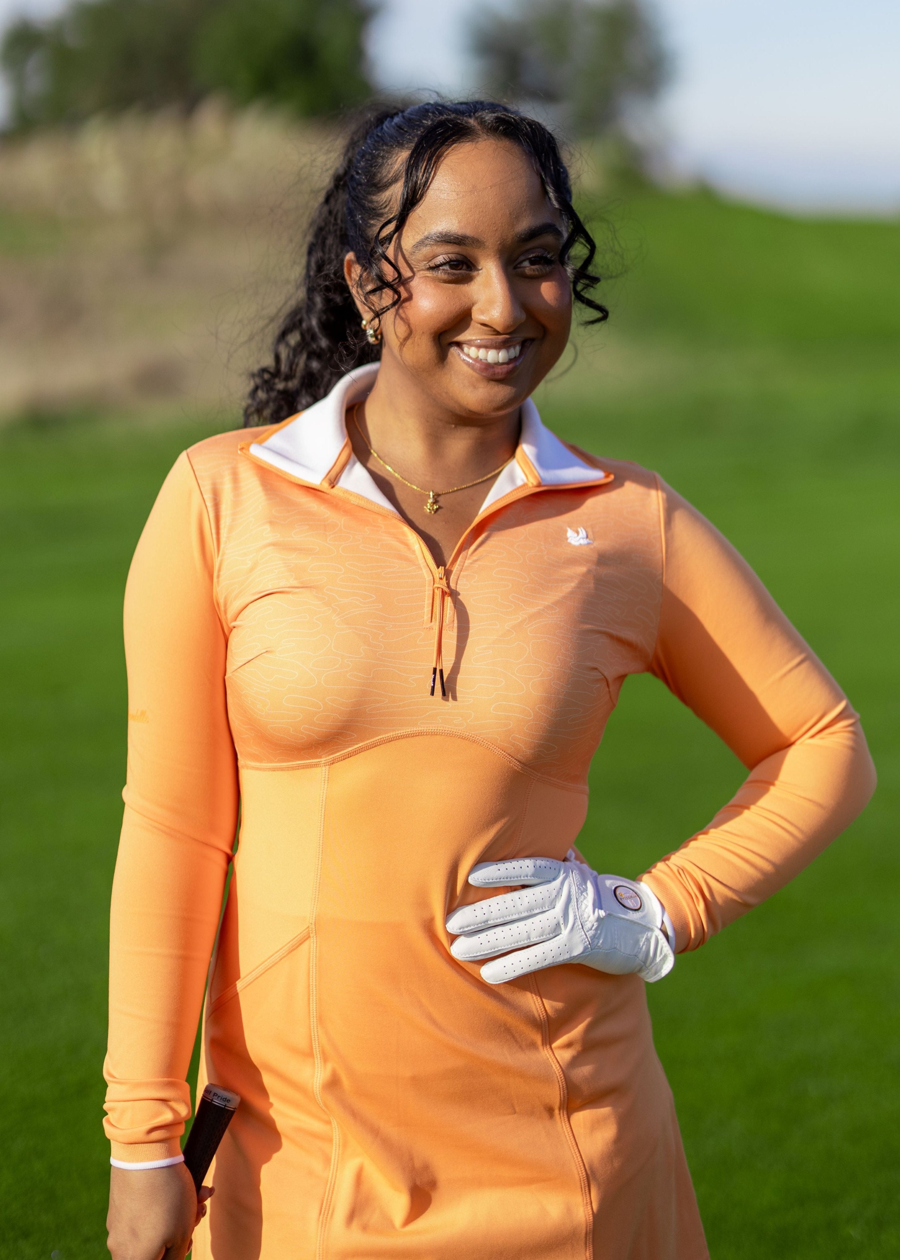 Hirondelle babe dress performance golf dress for women in orange tangerine full size long sleeve with knitted collar and cuffs